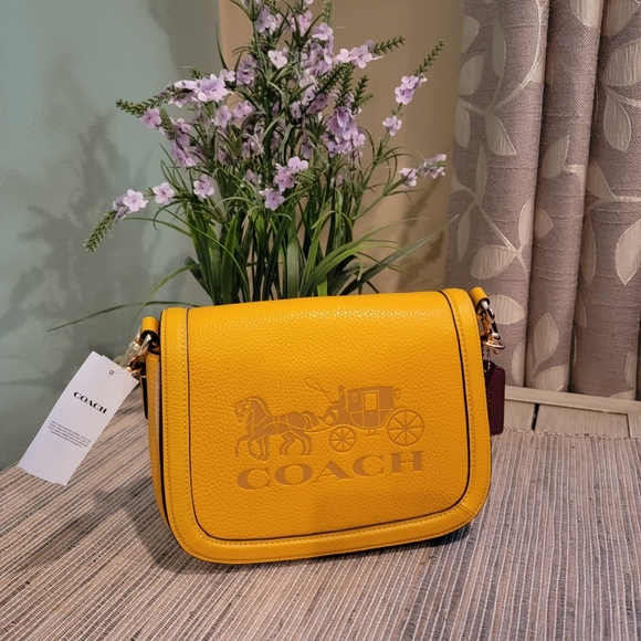 Coach Handbags - Coach Saddle bag with horse and carriage